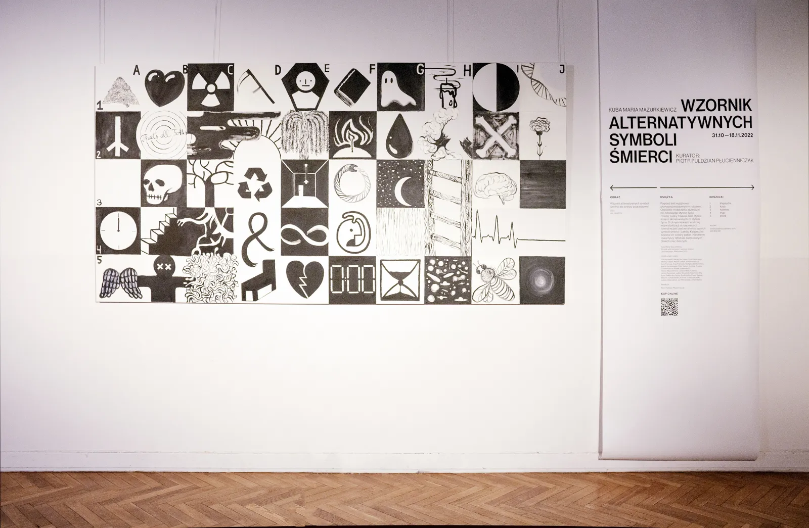 Obraz &ldquo;Wzornik alternatywnych symboli śmierci dla branży pogrzebowej&rdquo; wisi na ścianie